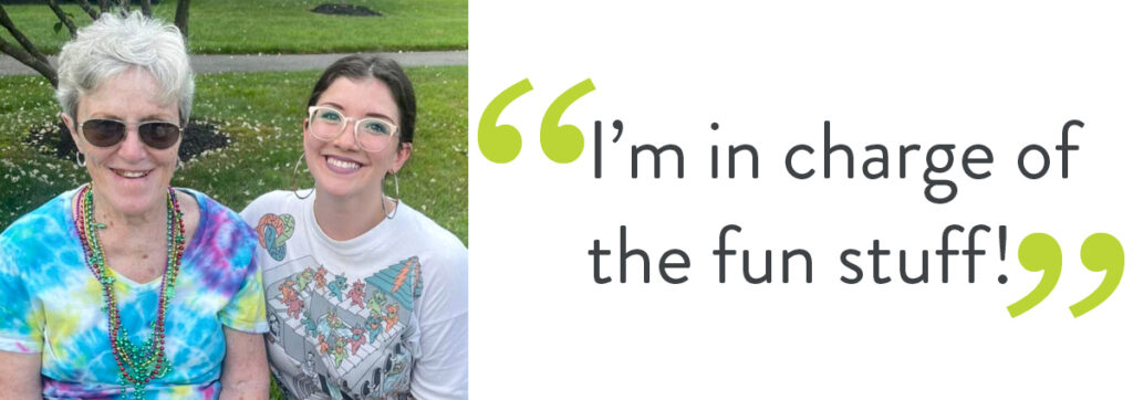 Smiling older adult next to a younger Atria employee with a quote that says "I'm in charge of the fun stuff!"